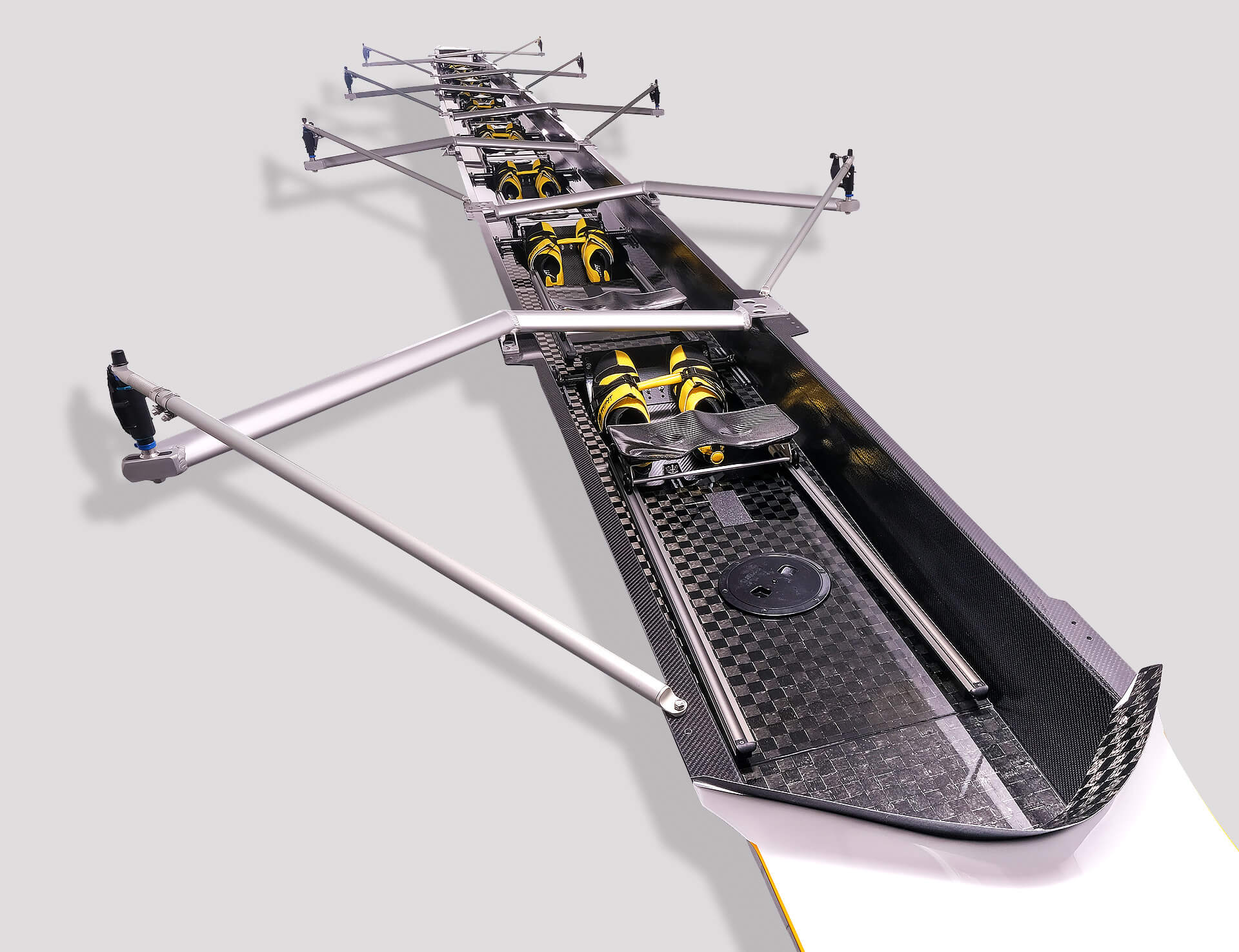 product shot of the SL Racing eights-rowing-boat-skiff-models with aluminium rigging and yellow and black shoes inside.